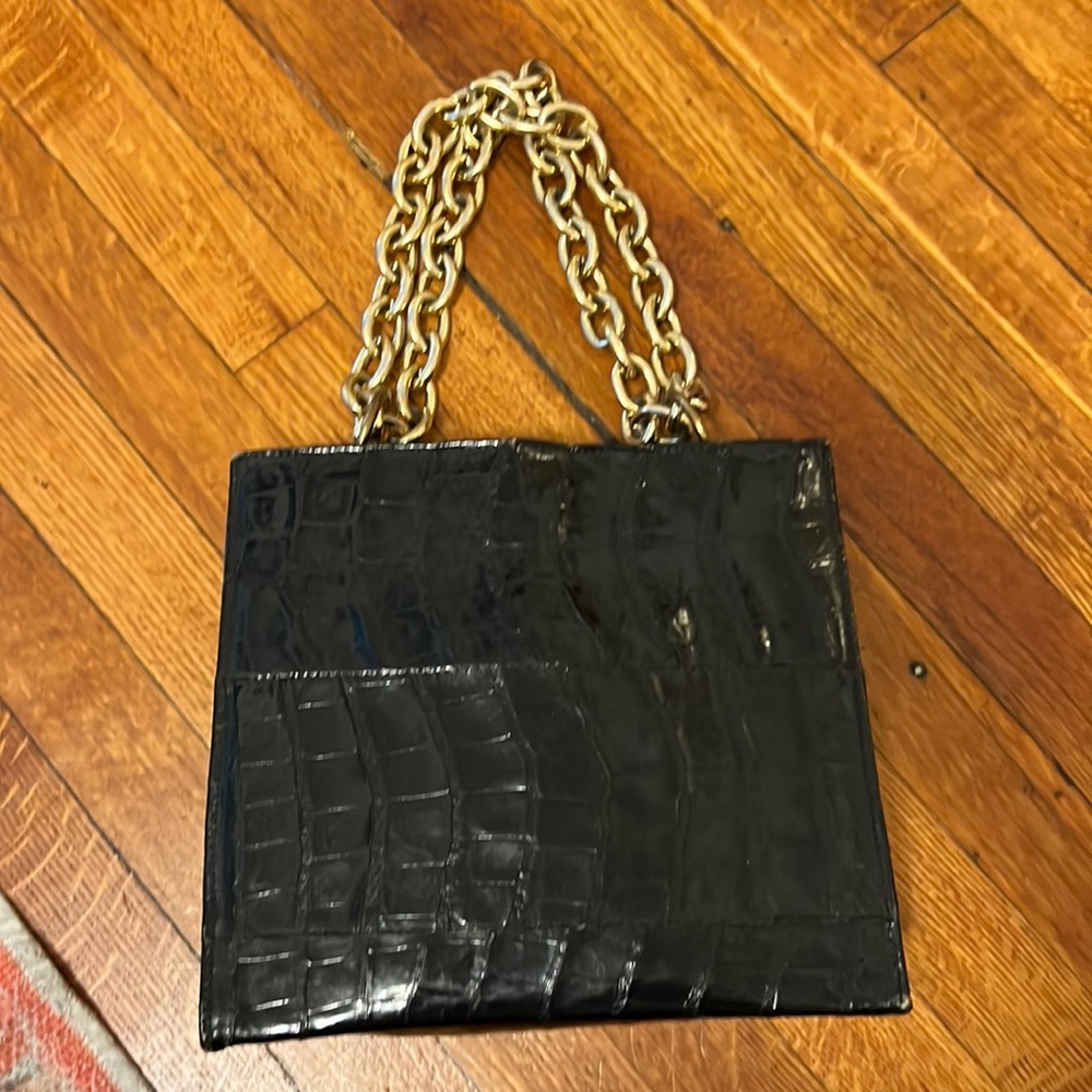 Black purse with adjustable gold chain